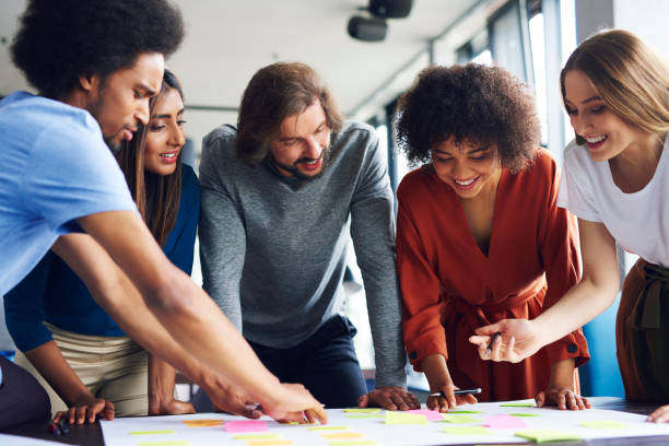 Creative business people planning with adhesive note